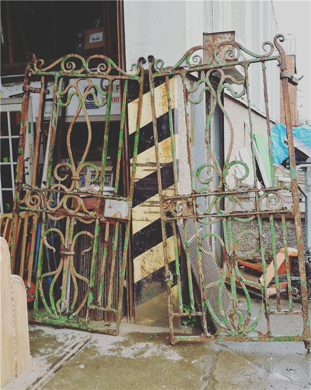 Old & original very heavy cast iron double gates. Gallery Image