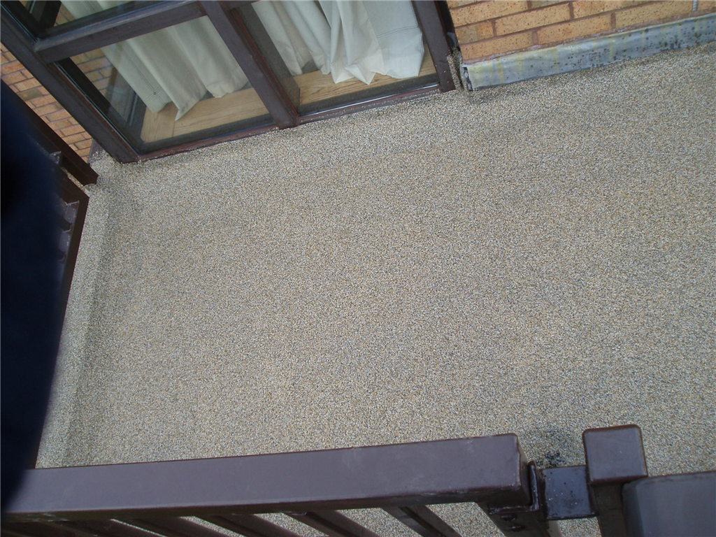 Roof terrace area, with Kemperol V210 waterproofing, and non-slip, quartz sand, finish. Gallery Image