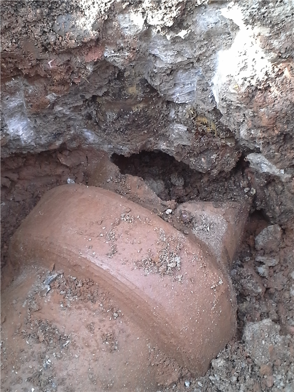 Cracked pipe before repair by Drain Doctor Gloucestershire Gallery Image