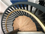 Stylish spiral staircase with brass handrail
 Gallery Thumbnail