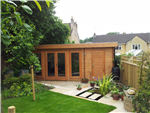 Garden Log Cabin with low profile flat roof & combined / integral store room / shed.  Makes the perfect garden office or studio room for hobbies. Gallery Thumbnail