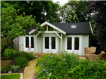 Garden Log Cabin Granny Annex.  Shower room, kitchen and full services installed by client.  All our log cabins are available custom designed.  Highest quality cabins in Europe. Gallery Thumbnail