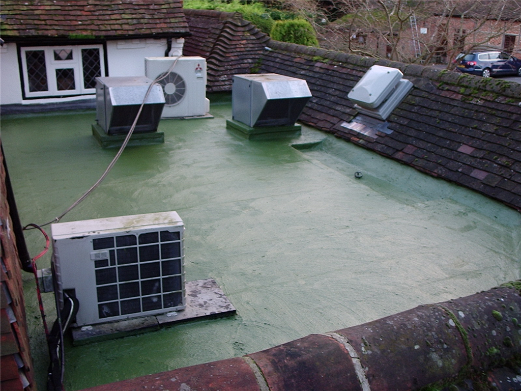 Acrylic coatings on kitchen roof at The Mill House, North Warnborough, Hampshire. Gallery Image