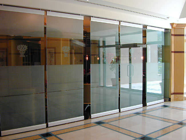 ModernGlide 700 top and bottom rail system. Glazed Gallery Image