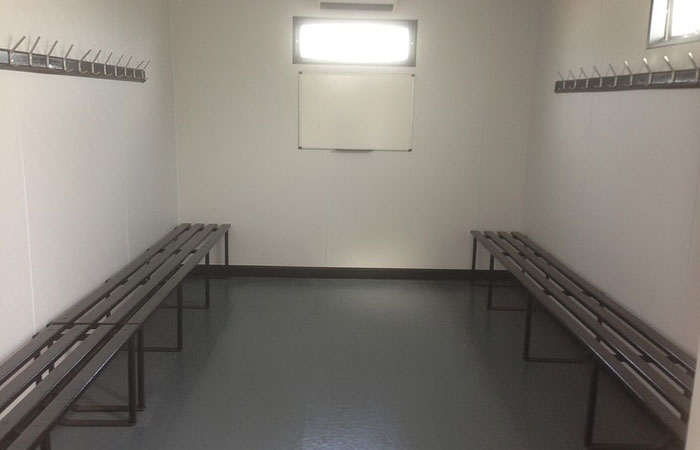 Fully refurbished interior of changing room for local football club Gallery Image