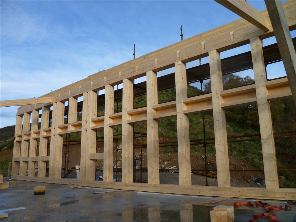 Glulam wall, 17.3m long by 6.0m high,manufactured and erected as part of a private dwelling outside Ballycastle. Gallery Image
