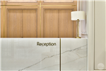 Marble reception desk with inlaid bronze Gallery Thumbnail