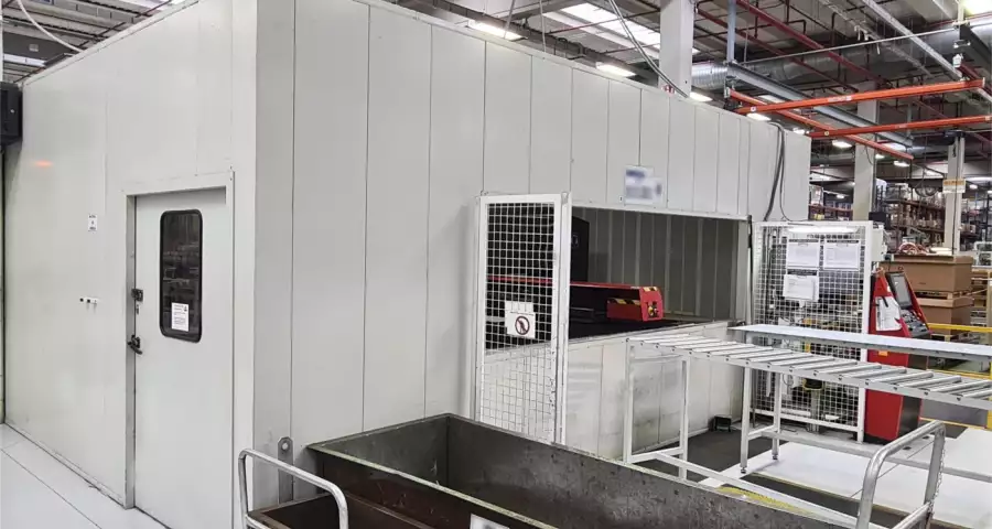 Factory noise enclosure with AC80 panels and opening for conveyor Gallery Image