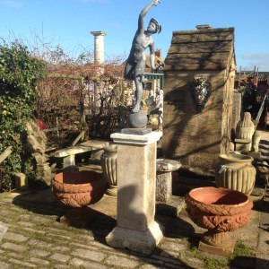 Lead statue of Mercury mounted on a stone plinth. Gallery Image
