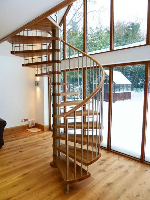 Bespoke Spiral Stair with oak treads and vertical steel balustrade  Gallery Image