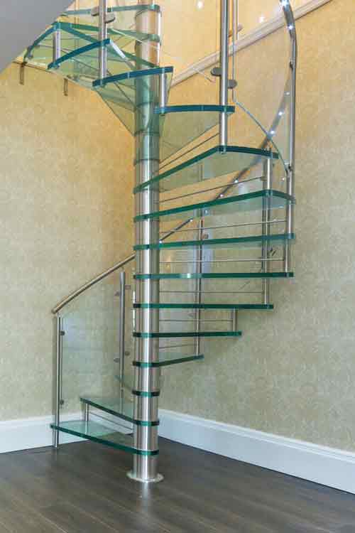 Bespoke Spiral Stair with 30mm laminated glass treads and curved glass balustrade  Gallery Image