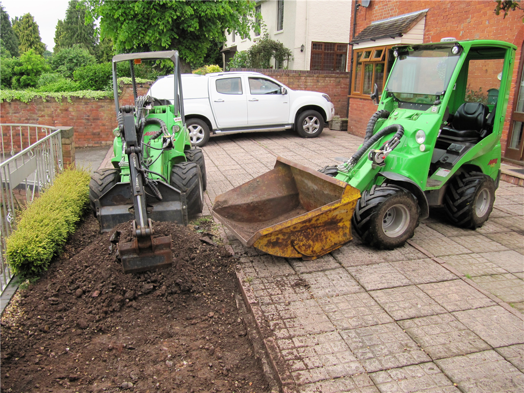 Two Loaders save time in tight spaces Gallery Image