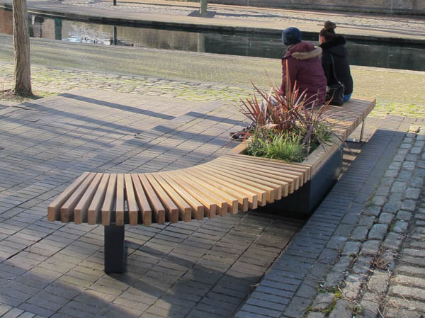 RailRoad 470mm high planter in mid-position of curved bench & straight bench Gallery Image