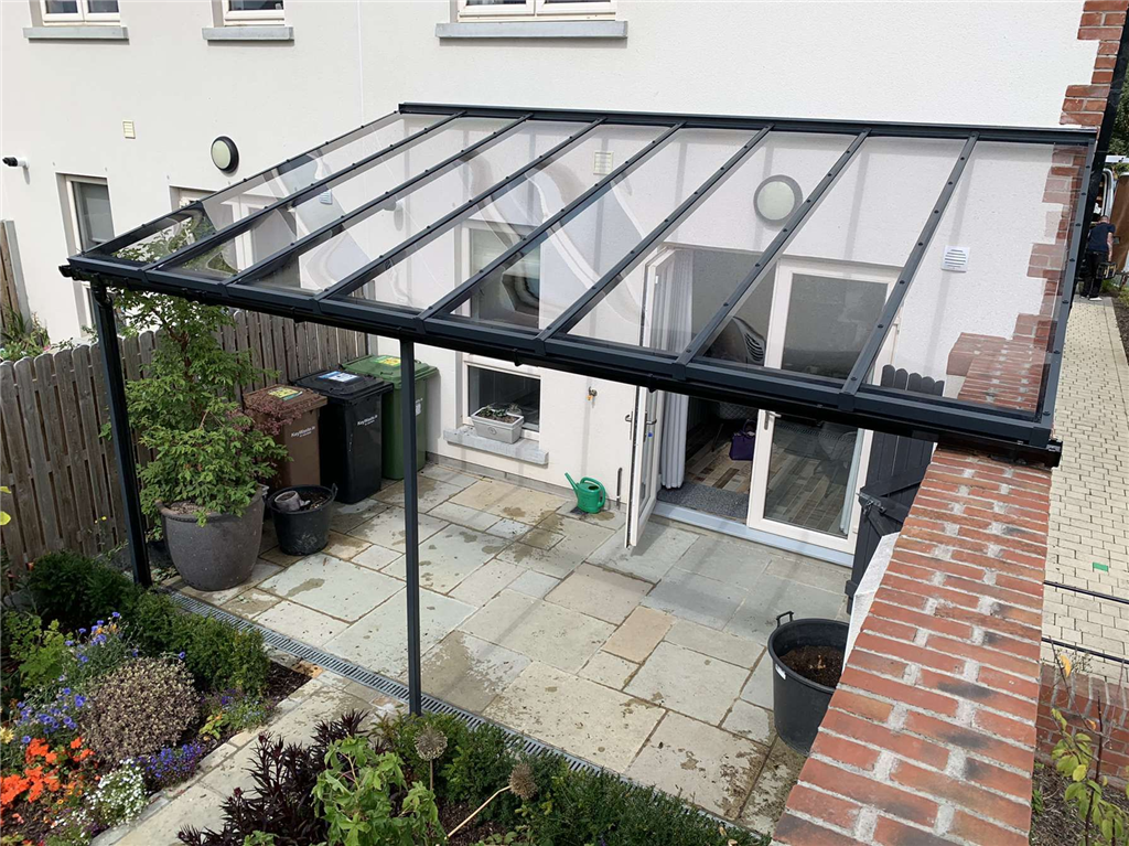 Black Patio Cover attached to existing wall. Gallery Image