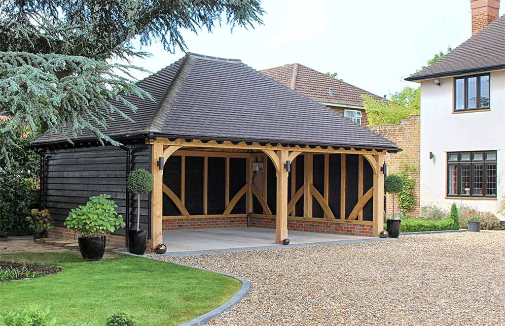 Open oak framed car port building. Gallery Image