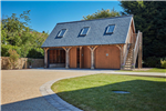 3 bay oak framed garage with office room above. Gallery Thumbnail