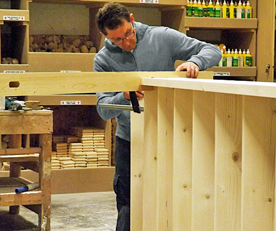 Hard at work fitting treads in the Pear Stairs factory Gallery Image