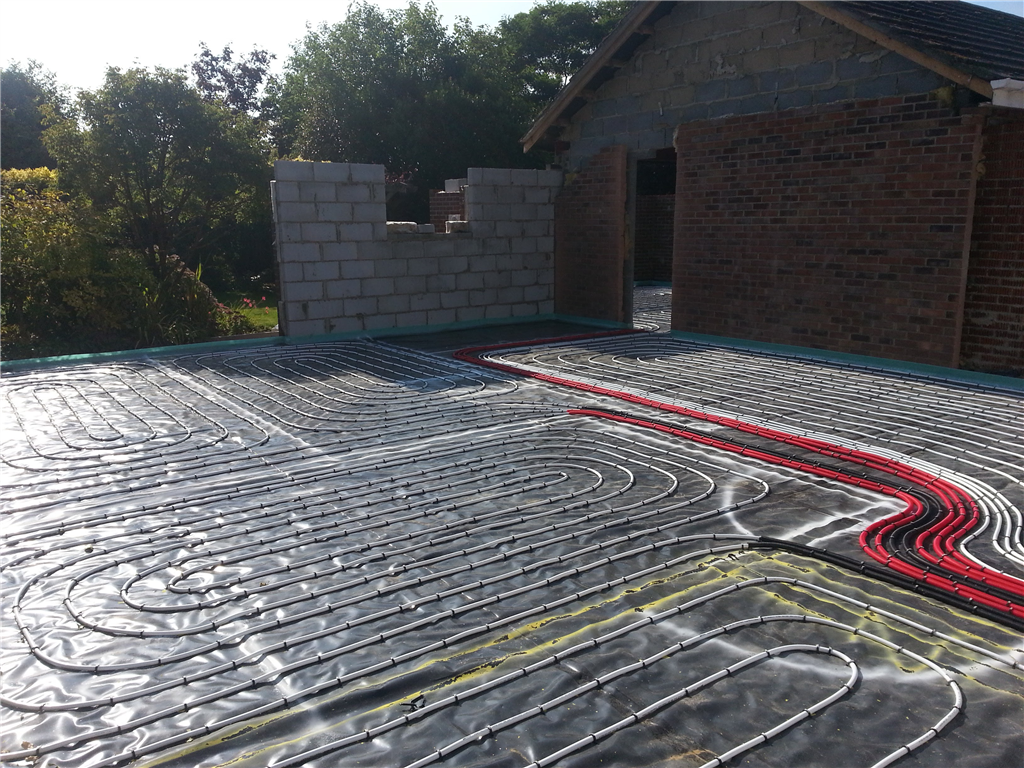 Flowscreed provided DPM membrane, wet underfloor heating system, followed by 75mm flowing concrete screed, over CUBE6 Thermal Flooring system panel. to fairview Emneth Norfolk Gallery Image