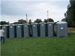 Single portable toilets at an event Gallery Thumbnail
