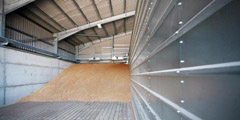 Grain Store, Norfolk.
Galvanised portal frame, fibre-cement roof, metal wall cladding, concrete grain wall panels, roller shutter doors & personnel doors. Gallery Image