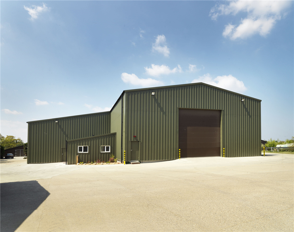 Insulated Potato Store with Workshop & Office Lean-to. Built in partnership with Marrison Agriculture Ltd. Site in Norfolk. Gallery Image