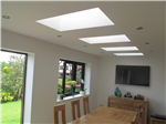 New dining room with downlights and Velux roof lights in a flat ceiling Gallery Thumbnail