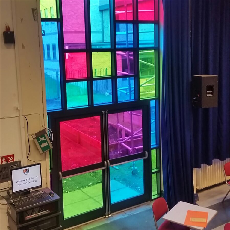 Transparent coloured film done in a church to replace stained glass. Gallery Image