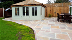 near Bognor Regis Indian sandstone patio with extra high fencing and heavy duty custom trellis Gallery Thumbnail