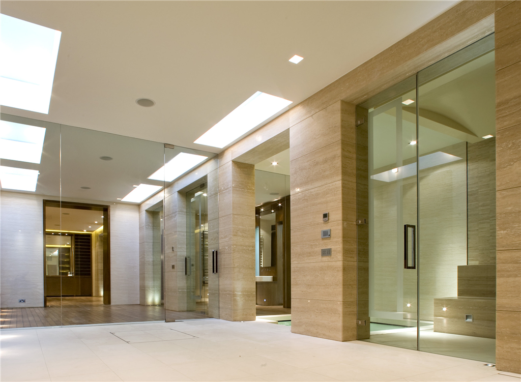 Frameless double glass doors and oversize mirrors  Gallery Image