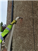 Installing insulation into the wall cavity. Gallery Thumbnail