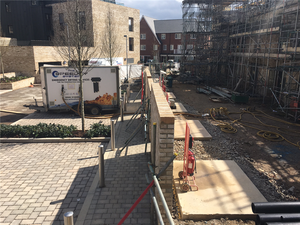 Hydronic drying of block of terraced  new build homes  Gallery Image