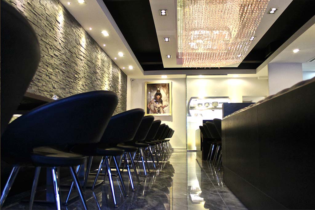 Azul Lagoa polished marble tiles & Nero CadFX wall cladding, The Kitchen restaurant, Middlesex. Gallery Image