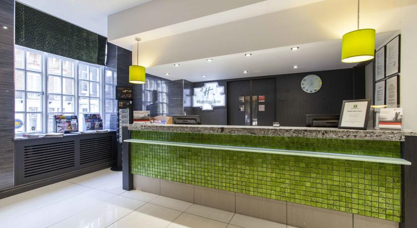 Bianco Antique granite reception desk, Holiday Inn Hotel, Oxford Street, London Gallery Image