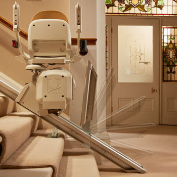 Stairlift with powered hinge rail Gallery Image