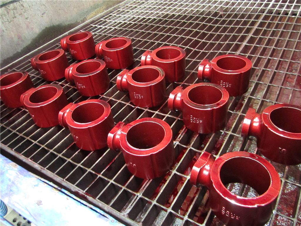 Dye penetrant testing on cast valve bodies. Gallery Image