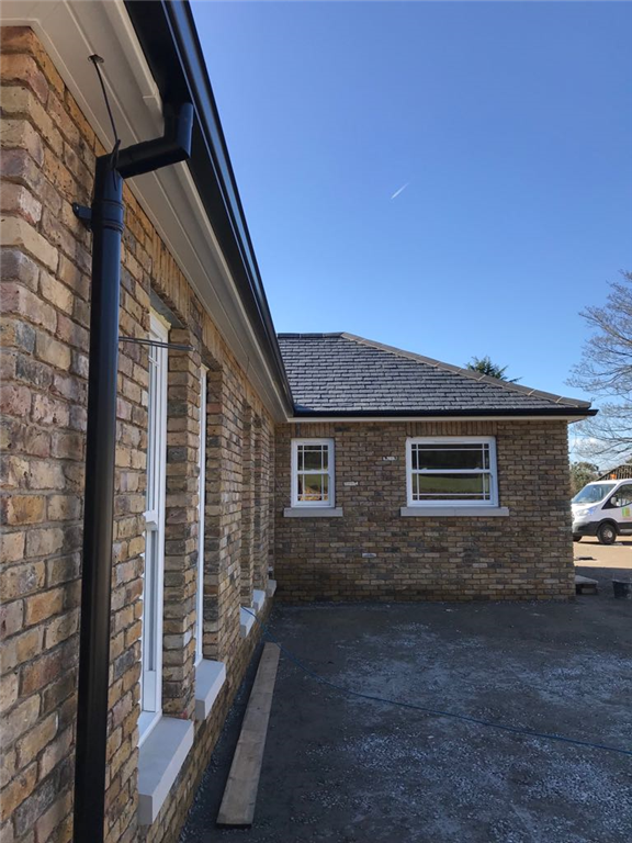 Following up on a full hoiuse installation, black 5" seamless aluminium gutter and pipe to outbuildings in Radlett, Hertfordshire. Gallery Image