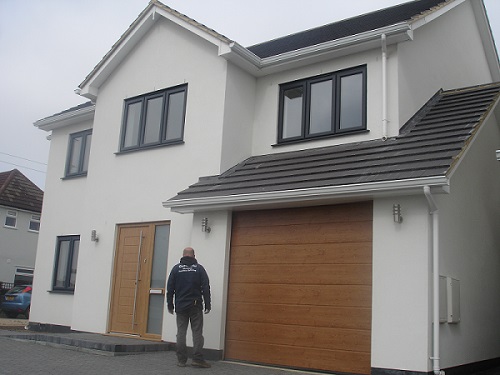 White 5"/130mm seamless aluminium gutter to new builds in Rayliegh, Essex. Gallery Image