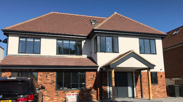 Anthracite grey (RAL 7016) aluminium fascia, soffit, gutter and pipe. Perfect for this coastal property in Southend on Sea, Essex  Gallery Image