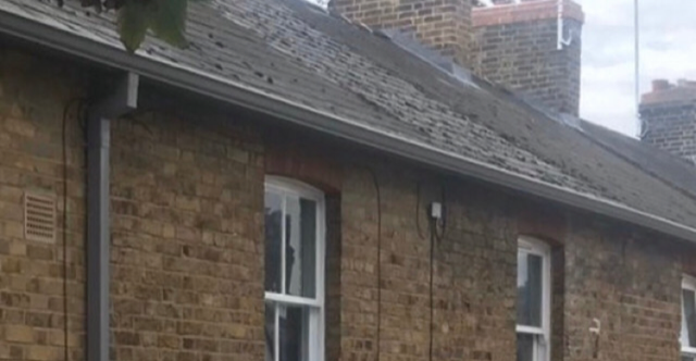 Dusty grey rooflines to properties on the Eton College Estate. Gallery Image