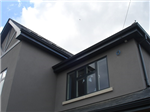 Anthracite grey (RAL 7016) aluminium fascia, soffit, gutter and pipe to this coastal home in Frinton on Sea, Essex. Gallery Thumbnail