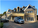 Black 6"/152.8mm seamless aluminium gutter, with cast collar pipes and hoppers fitted in Emerson Park, Essex. Gallery Thumbnail