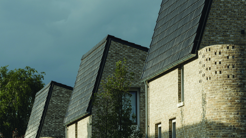 Crest Nelskamp specially designed 70 degree angle H14 black clay roofing tile.
Goldsmith Street wins RIBA Stirling Prize. Gallery Image