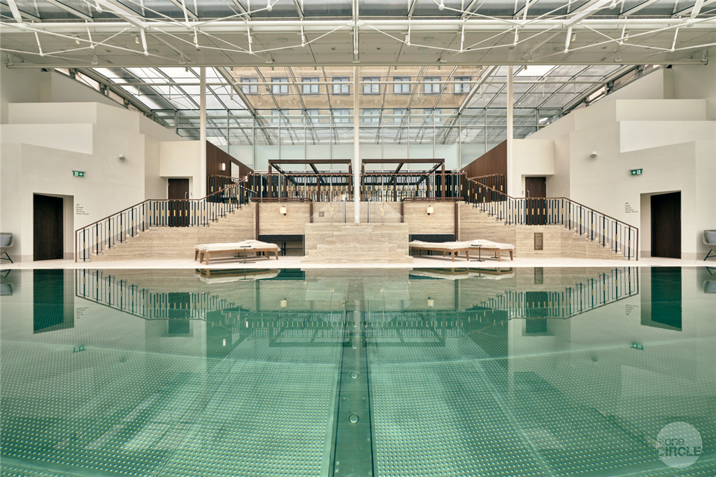 Silver Travertine wall in hotel swimming pool Gallery Image