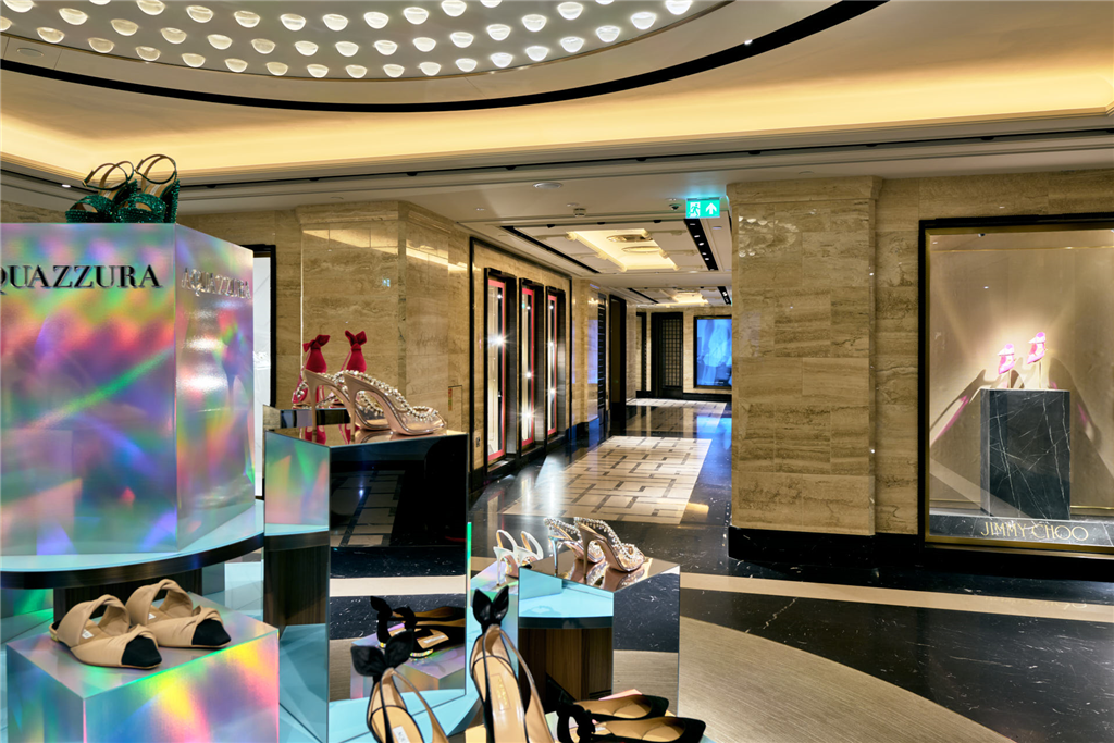 Travertine wall cladding and marble flooring in Harrods' Shoe Heaven Gallery Image