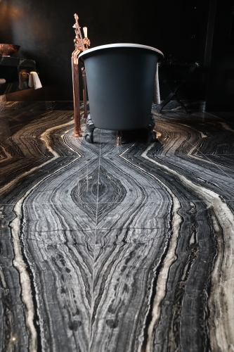 Book matched Black Wave marble floor in Mandrake Hotel Gallery Image