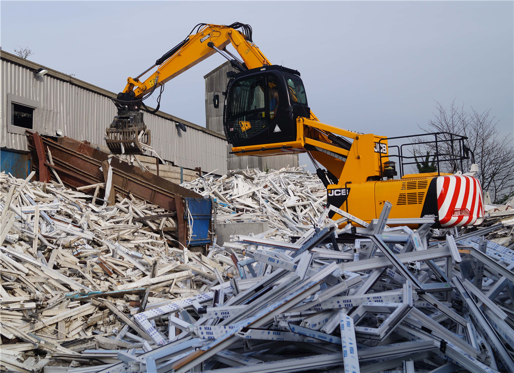 Waste PVC frames awaiting recycling by VEKA Recycling Gallery Image