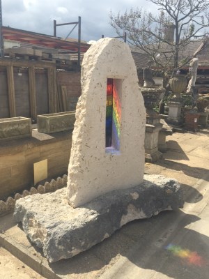 A Portland stone garden feature with rainbow leaded light glass. Gallery Image