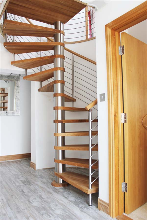 Bespoke Spiral Stair with oak treads and horizontal steel balustrade  Gallery Image
