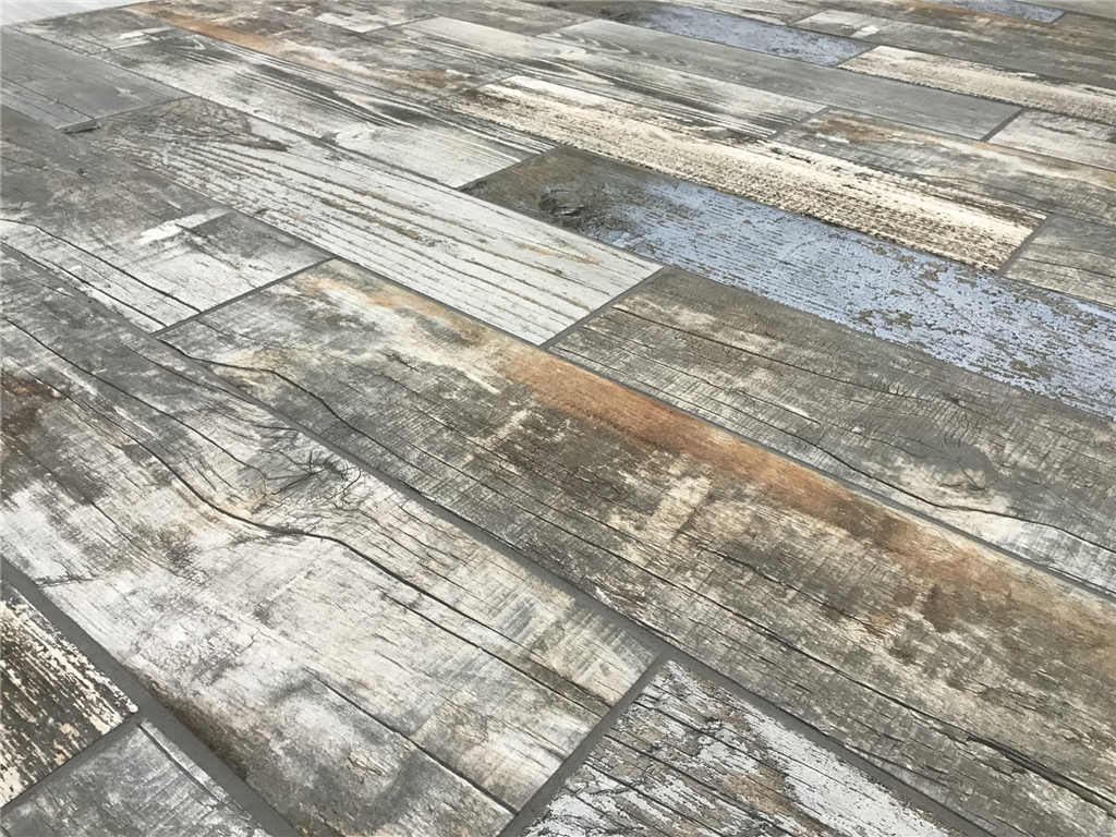 Santa Monica 600x150 mm porcelain tile, possess an element of natural wooden painted planks.
The matt wood effect floor tile has cleverly been made to give a distressed look.
 Gallery Image