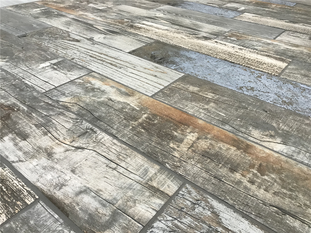 Santa Monica 600x150 mm porcelain tile, possess an element of natural wooden painted planks.
The matt wood effect floor tile has cleverly been made to give a distressed look.
 Gallery Image